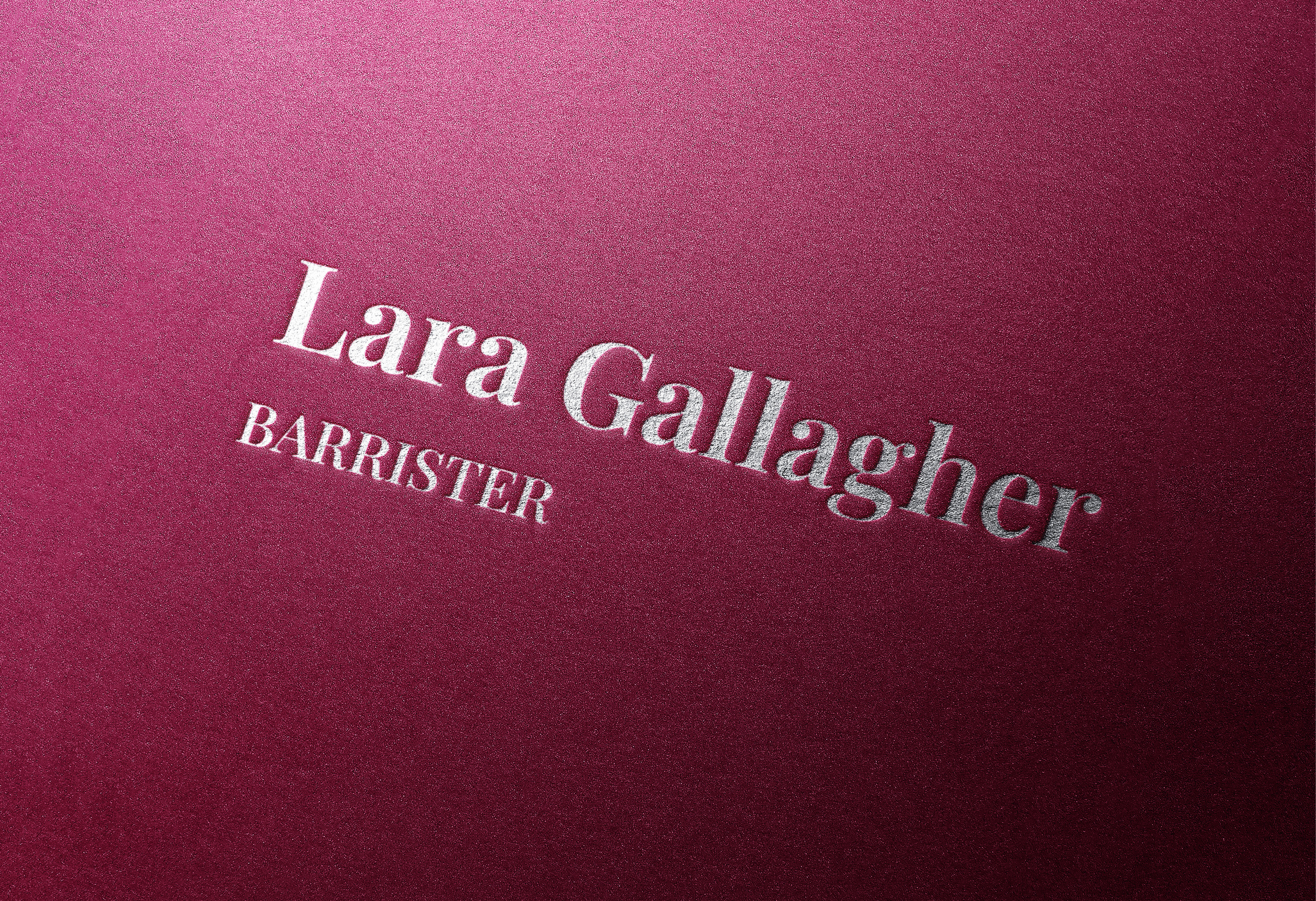 Lara Gallager logo embossed on leather